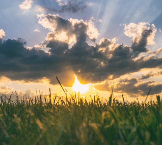 Sunlight through clouds in sky